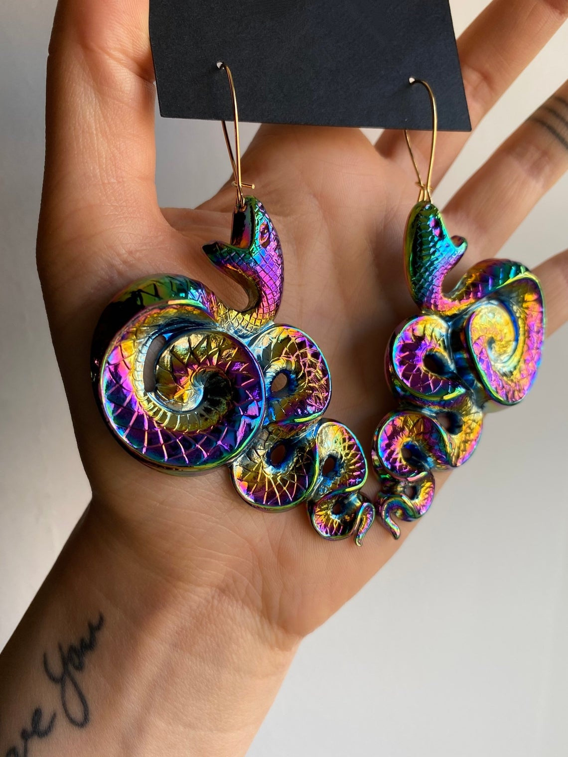 Psychedelic insect earrings glossy too