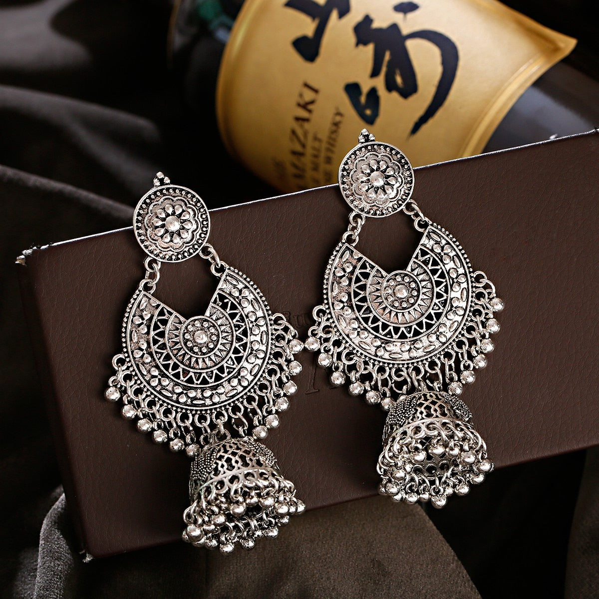 East Indian inspired Flower Bell Tassel Earrings - Handcrafted earrings featuring intricate floral design, delicate bells, and stylish tassels. A blend of cultural elegance and modern fashion for a stunning accessory