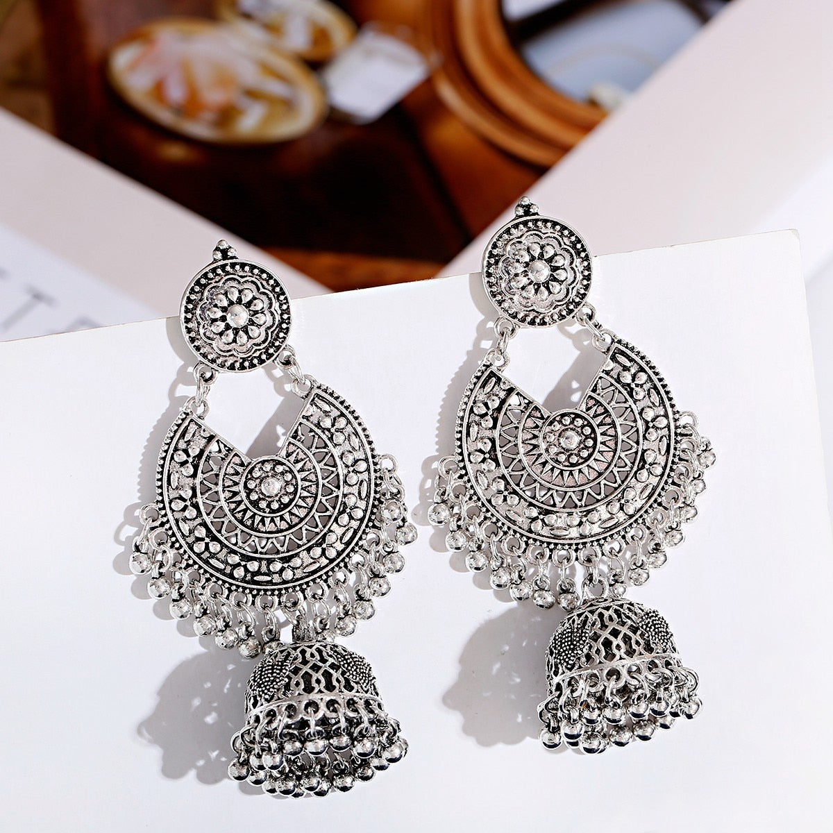 East Indian inspired Flower Bell Tassel Earrings - Handcrafted earrings featuring intricate floral design, delicate bells, and stylish tassels. A blend of cultural elegance and modern fashion for a stunning accessory