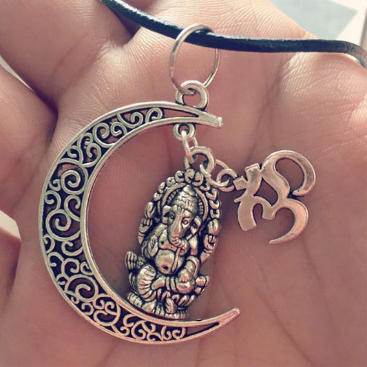 Spiritual Ganesha-Om Necklace - Symbolic jewelry representing divine connection and spiritual harmony with Ganesha and Om symbols.