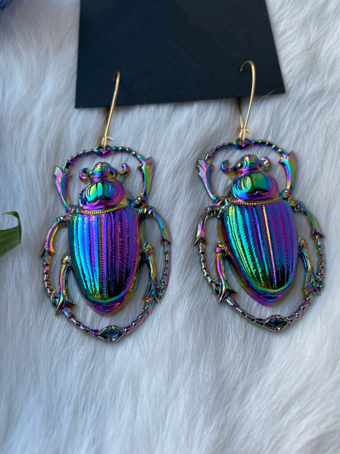 Psychedelic insect earrings glossy too