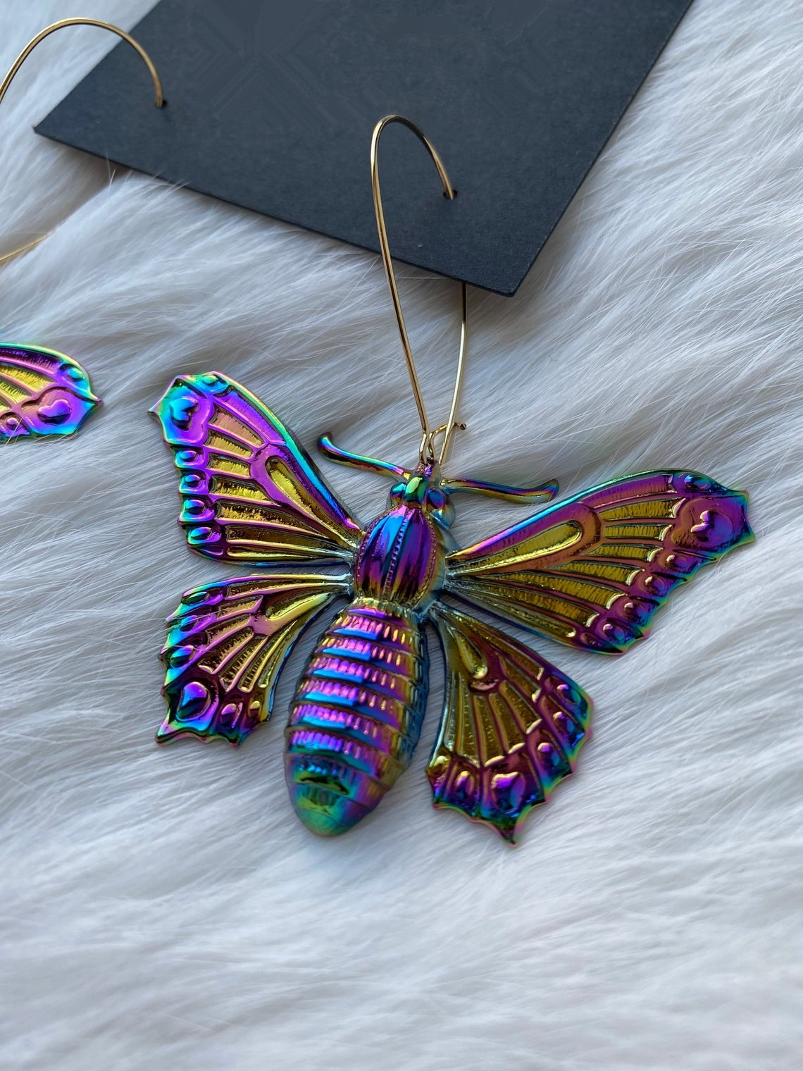 Psychedelic insect earrings glossy too