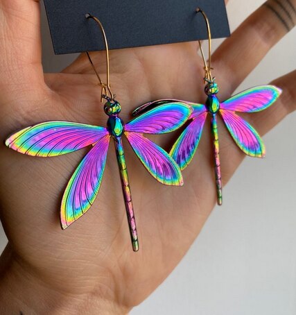 Psychedelic insect earrings glossy too