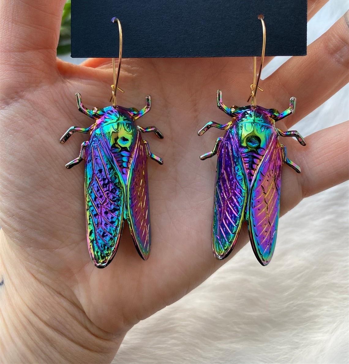 Psychedelic insect earrings glossy too