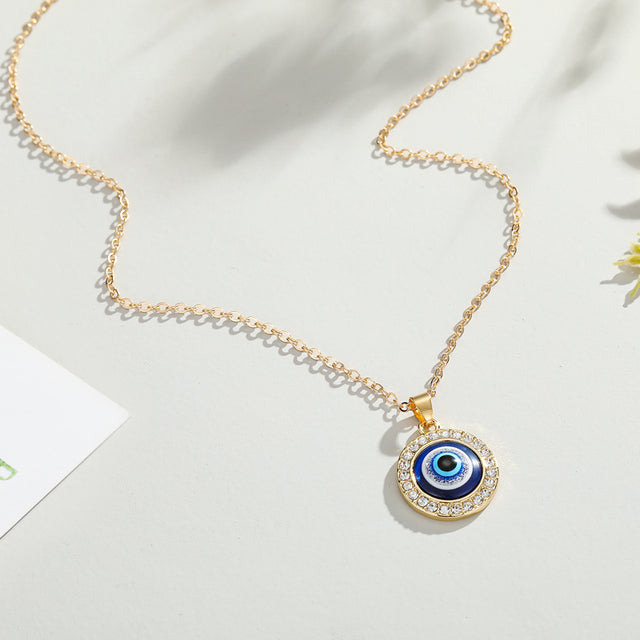 Turkish Blue Eye Pendant NecklaceTurkish Evil Eye Pendant Necklace - Symbol of protective charm.