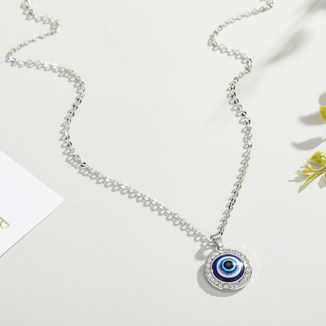 Turkish Blue Eye Pendant NecklaceTurkish Evil Eye Pendant Necklace - Symbol of protective charm.