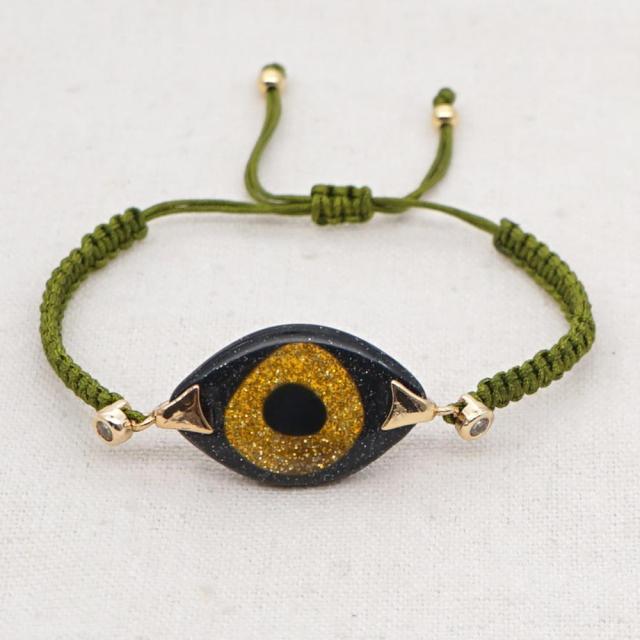 Turkish Evil Eye Braided Rope Bracelet - Symbolic charm representing spirituality. Glossy Too