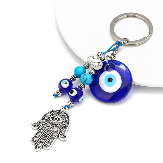 Turkish Evil Eye & Hand of Fatima Keychain - Symbol of spiritual protection and charm.